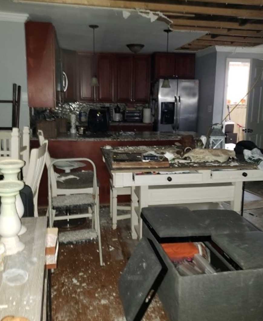 Fire restoration — smoke and fire damaged walls before remediation
