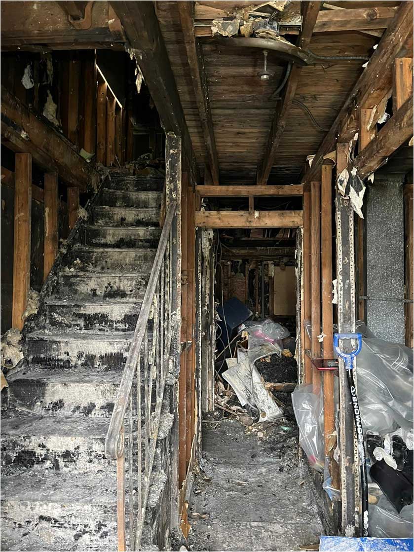 Water damage restoration — flooded interior before treatment